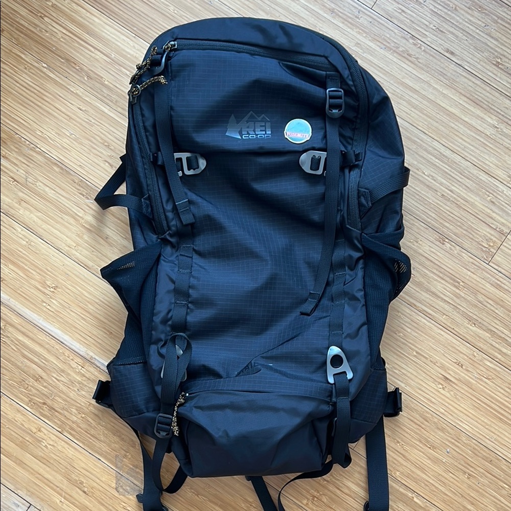 REI Black Outdoor Backpack with Durable Design